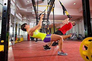 Упражнения на TRX для развития силы и мышечной массы - изображение